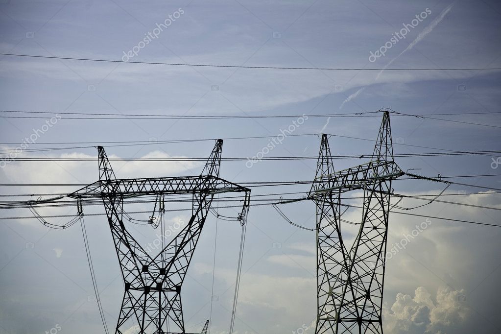 High voltage power line over blue sky Stock Photo by ©Arrfoto 89148232