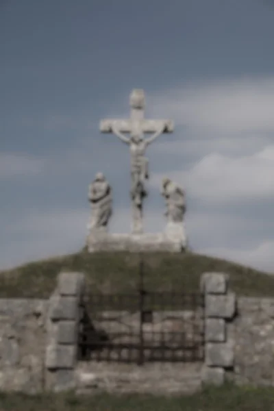 De fundo focado da escultura crucificação Calvário — Fotografia de Stock