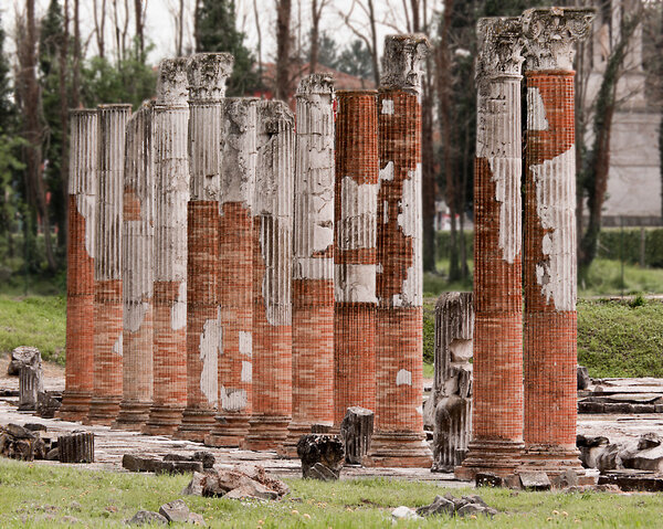 Roman columns in archaeological park in Aquileia, Italy