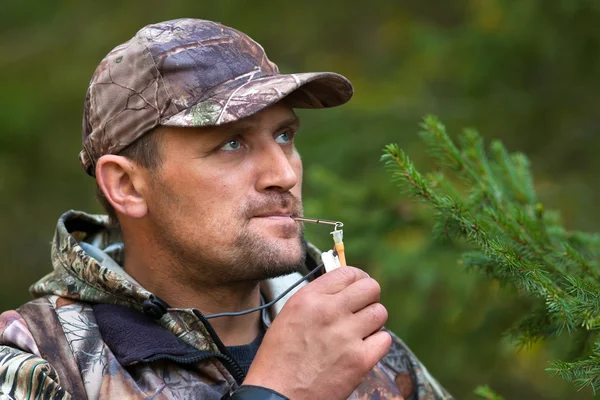 Hunter with a grouse call — Stock Image Hunter with a grouse call Stock Picture