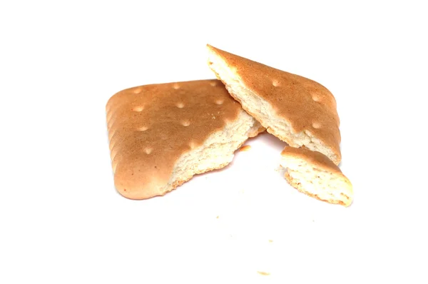 Galletas cuadradas sobre un fondo blanco —  Fotos de Stock