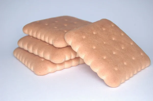 Square cookies on a white background — Stock Photo, Image