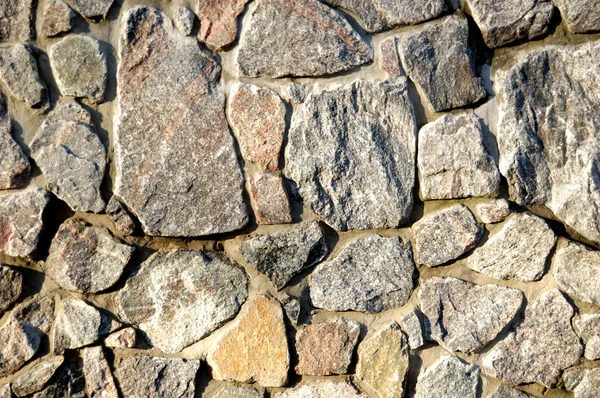 Wall made of granite Stock Image