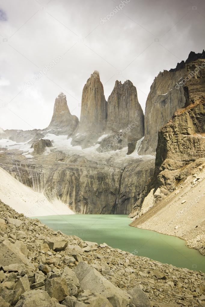 torres del paine lake in patagonia with rock walls