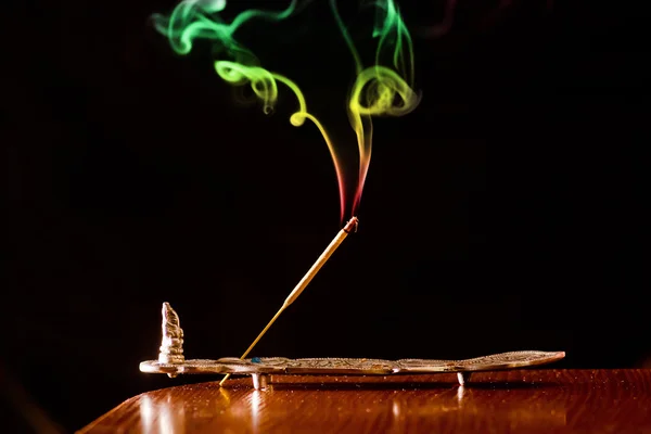 Colored smoke on a black background — Stock Photo, Image