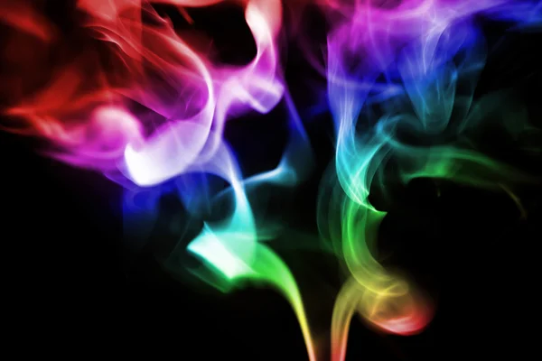 Colored smoke on a black background — Stock Photo, Image