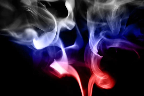 Colored smoke on a black background with russian flag — Stock Photo, Image