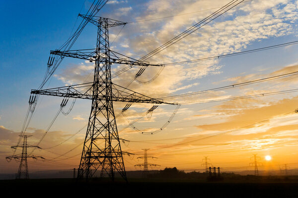 Electrical pylon and high voltage power lines near transformatio