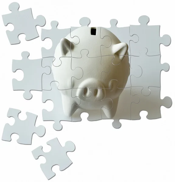 Piggy bank made of puzzle - economy and finance — Stock Photo, Image