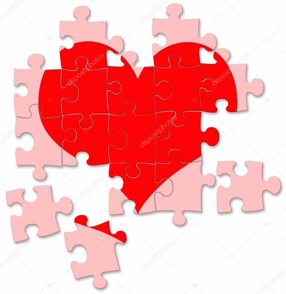 red broken heart made by puzzle pieces