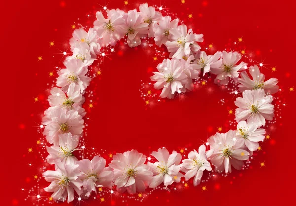 Hart gemaakt van sterren op rode achtergrond - saint Valentijnsdag — Stockfoto