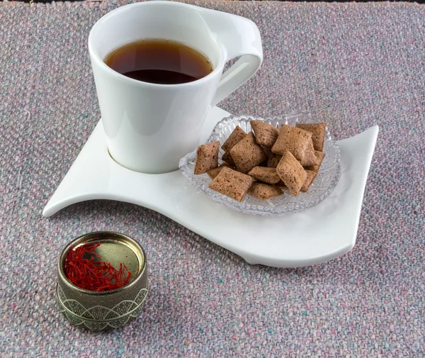 Tasse de thé et de bonbons — Photo