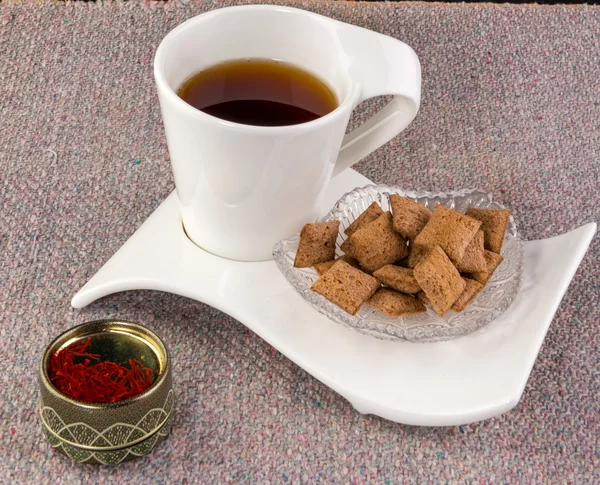 Tasse de thé et de bonbons — Photo