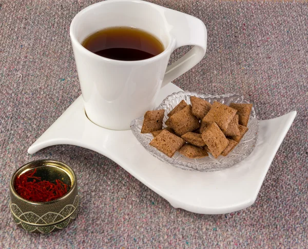 Tasse de thé et de bonbons — Photo