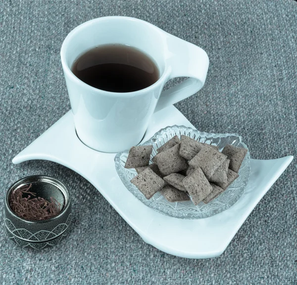 Filiżanka herbaty i słodycze — Zdjęcie stockowe