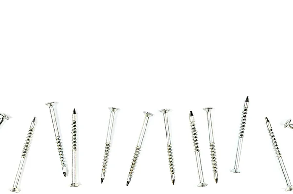 Lot of bolts on white background — Stock Photo, Image