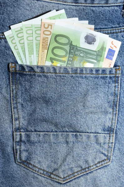 Euro banknotes in jeans back pocket — Stock Photo, Image