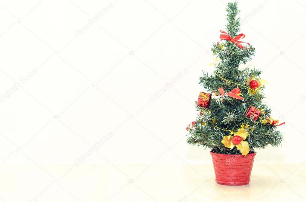 Decorated Christmas tree on a light background