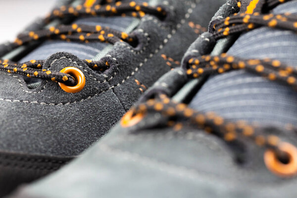 Details of hiking shoes. Still, artificial light