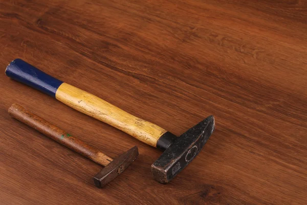 The Hummer equipment on the wood — Stock Photo, Image