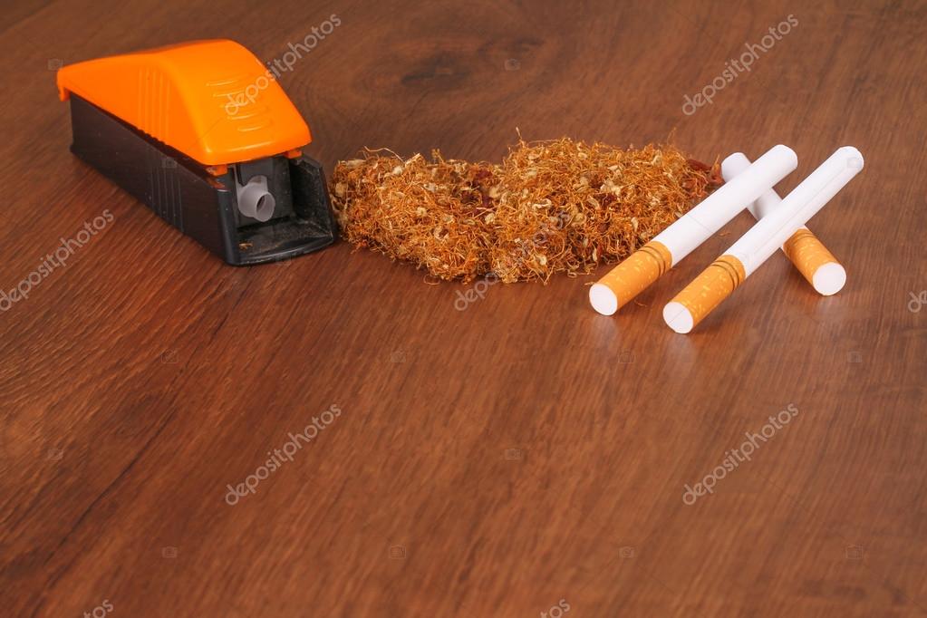 The Homemade cigarettes made with tobacco and other equipment — Stock