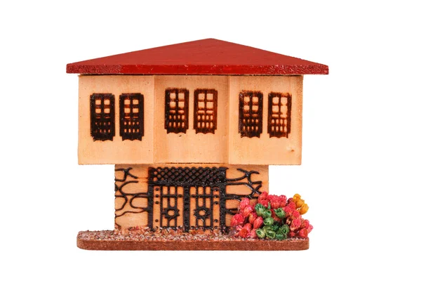 De miniatuur poppenhuis op de witte achtergrond — Stockfoto