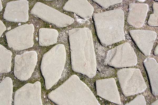 Texture of pavement of large grey boulders — Stock Photo, Image