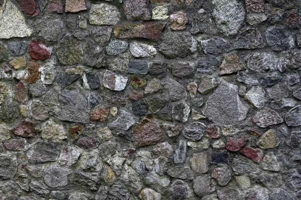 La textura de la pared de piedras de colores — Foto de Stock