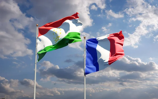 Hermosas Banderas Estatales Nacionales Francia Tayikistán Juntas Fondo Del Cielo —  Fotos de Stock