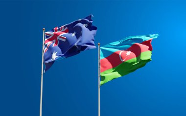 Gökyüzü arka planında Azerbaycan ve Avustralya 'nın güzel ulusal bayrakları birlikte. 3B sanat eseri konsepti.