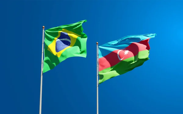 아름다운 아제르바이잔과 브라질의 국기들이 하늘을 배경으로 있습니다 — 스톡 사진