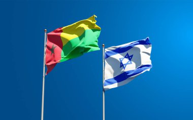 İsrail ve Gine-Bissau 'nun güzel ulusal bayrağı gökyüzü arka planında birlikte. 3B sanat eseri konsepti.