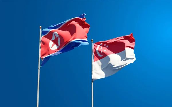Belle Bandiere Nazionali Stato Della Corea Del Nord Singapore Insieme — Foto Stock