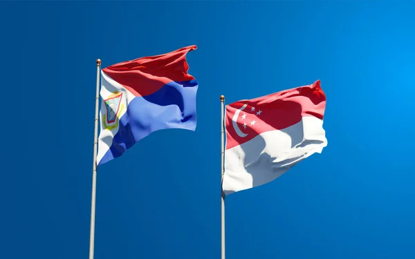Piękne Flagi Państwowe Sint Maarten Singapuru Razem Tle Nieba Koncepcja — Zdjęcie stockowe