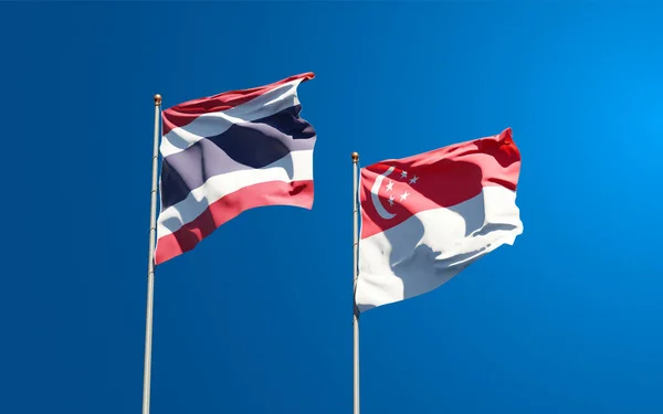 Красивые Национальные Государственные Флаги Таиланда Сингапура Вместе Фоне Неба Концепция — стоковое фото