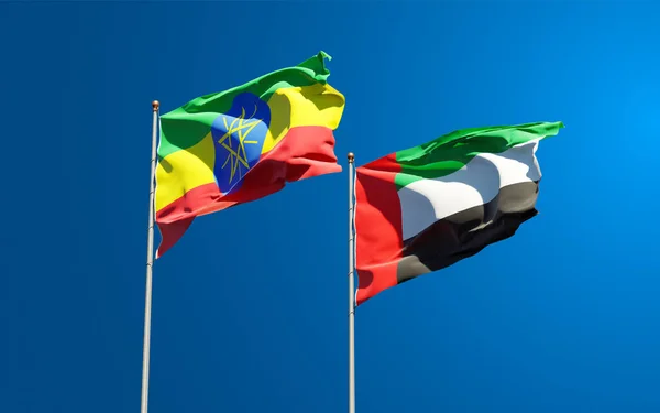 아름다운 에티오피아와 아랍에미리트 연방의 국기가 하늘을 배경으로 있습니다 — 스톡 사진