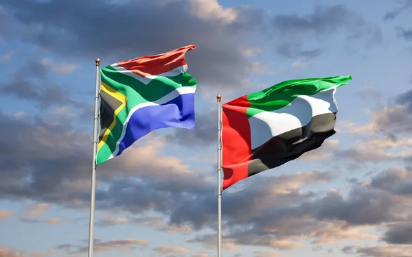 美丽的南非国旗和阿拉伯联合酋长国国旗在天空的背景下共同飘扬 3D艺术品概念 — 图库照片