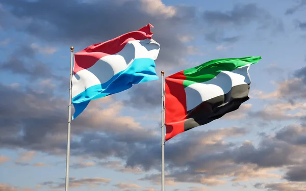 美丽的卢森堡国旗和阿拉伯联合酋长国国旗在天空背景下相映成趣 3D艺术品概念 — 图库照片