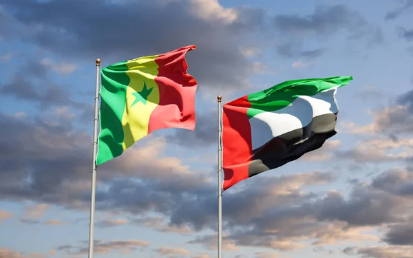 美丽的塞内加尔国旗和阿拉伯联合酋长国国旗在天空背景下相映成趣 3D艺术品概念 — 图库照片