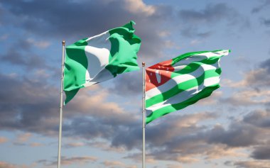 Gökyüzü arka planında Nijerya ve Abhazya 'nın güzel ulusal bayrakları birlikte. 3B sanat eseri konsepti.