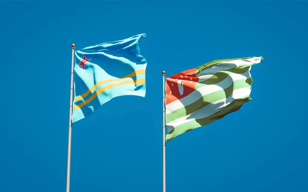 Belas Bandeiras Estatais Nacionais Abcásia Aruba Juntas Fundo Céu Conceito — Fotografia de Stock