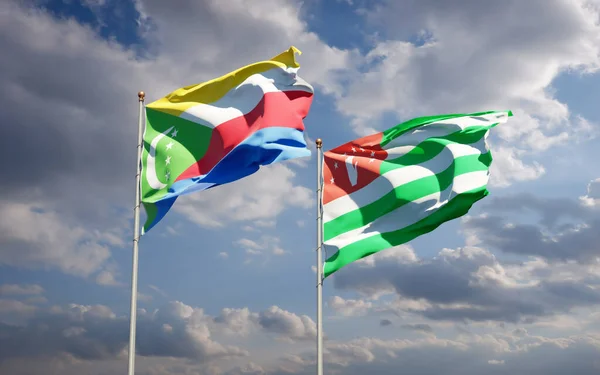 Hermosas Banderas Estatales Nacionales Abjasia Comoras Juntas Fondo Del Cielo —  Fotos de Stock