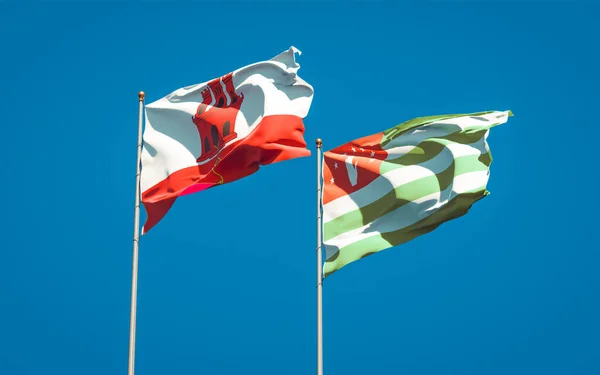 Lindas Bandeiras Estatais Nacionais Gibraltar Abcásia Juntas Fundo Céu Conceito — Fotografia de Stock