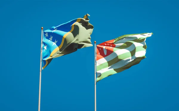 Prachtige Nationale Vlaggen Van Salomonseilanden Abchazië Samen Achtergrond Van Lucht — Stockfoto