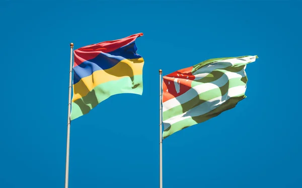 Prachtige Nationale Vlaggen Van Mauritius Abchazië Samen Achtergrond Kunstwerkconcept — Stockfoto