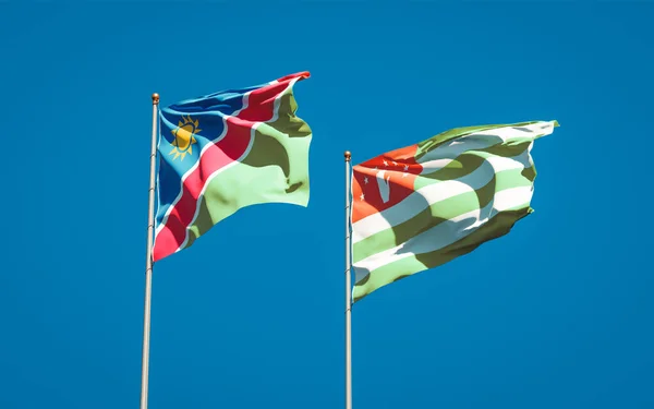 Hermosas Banderas Estatales Nacionales Namibia Abjasia Juntas Fondo Del Cielo — Foto de Stock