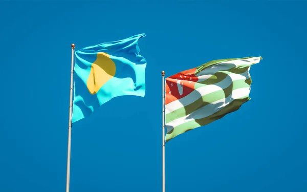 Piękne Flagi Państwowe Palau Abchazji Razem Tle Nieba Koncepcja Grafiki — Zdjęcie stockowe