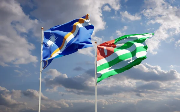 美丽的马绍尔群岛和阿布哈兹国旗在天空的背景下齐聚一堂 3D艺术品概念 — 图库照片