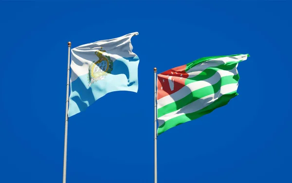 Gyönyörű Nemzeti Zászlók San Marino Abházia Együtt Hátterében Művészeti Koncepció — Stock Fotó
