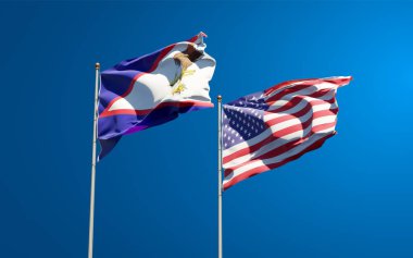 ABD ve Amerikan Samoası 'nın güzel ulusal bayrakları gökyüzü arka planında birlikte. 3B sanat eseri konsepti. 